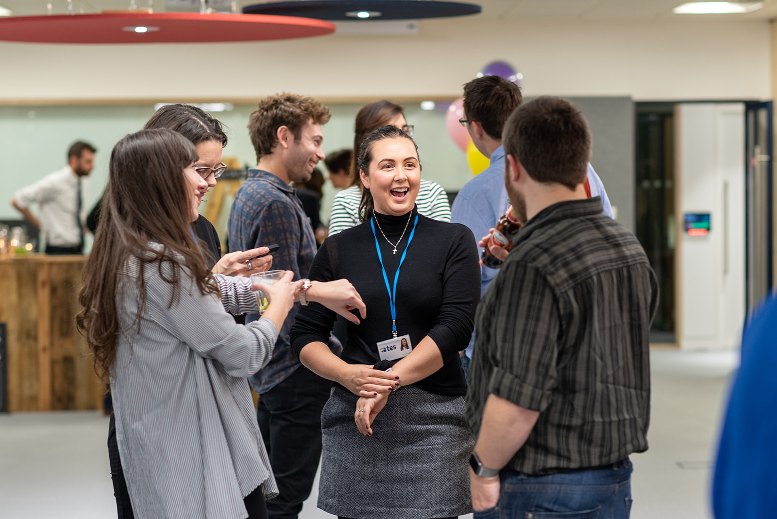 Tes colleagues chatting in a small group